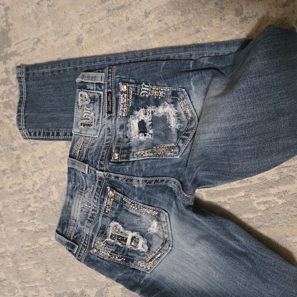 Signature Blue Distressed Jeans with Embellishments
